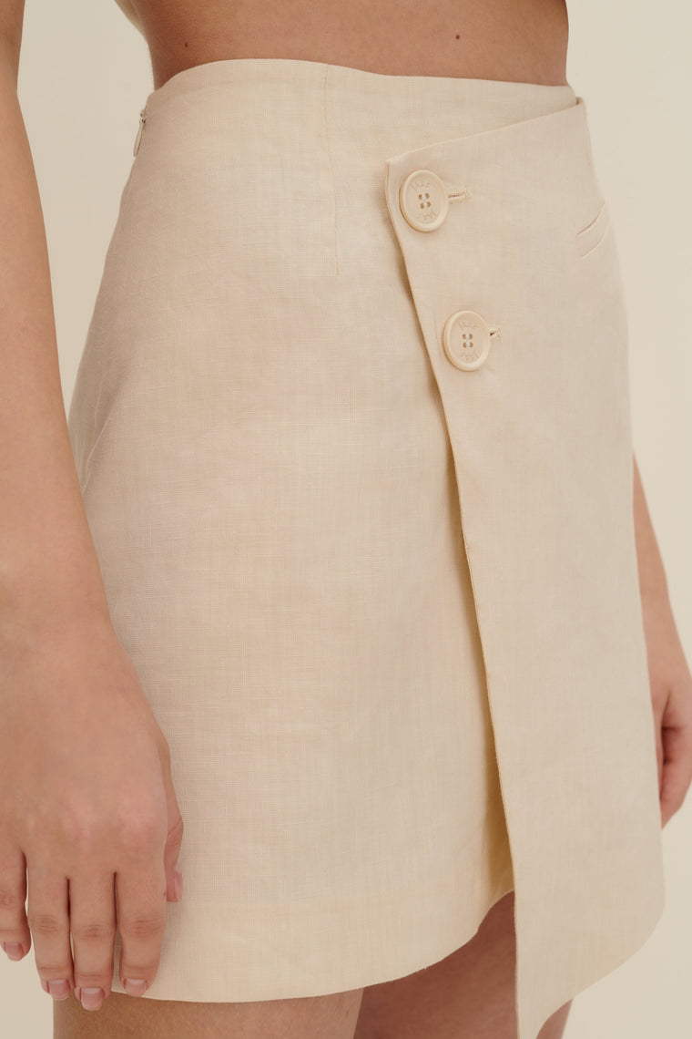 Asymmetric mini skirt in Sandy Beige