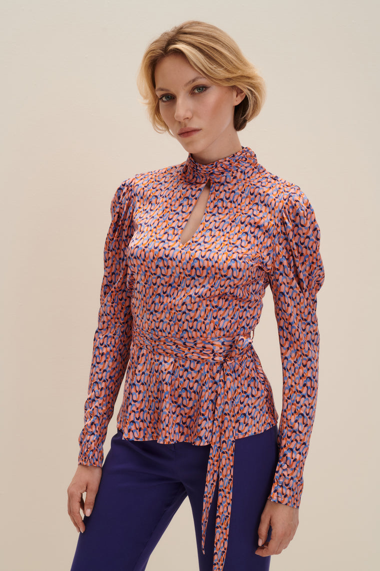 Turtleneck cutout blouse in Groovy Print